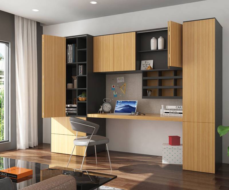 A home based office solution for anyone liking a tidy home: at the end of the day, all work utensils are stored away and can disappear behind the folding doors. Photo: Hettich